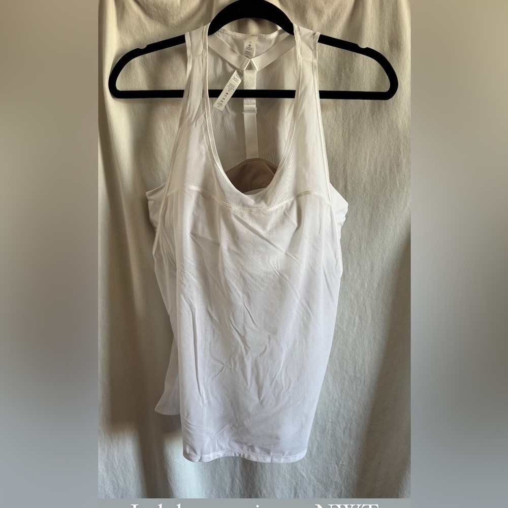 New with tags Lululemon Light and Breezy tank size 12